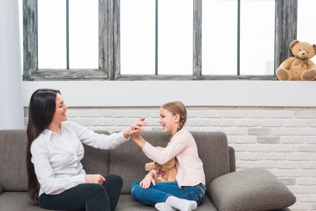 happy-female-psychologist-giving-high-five